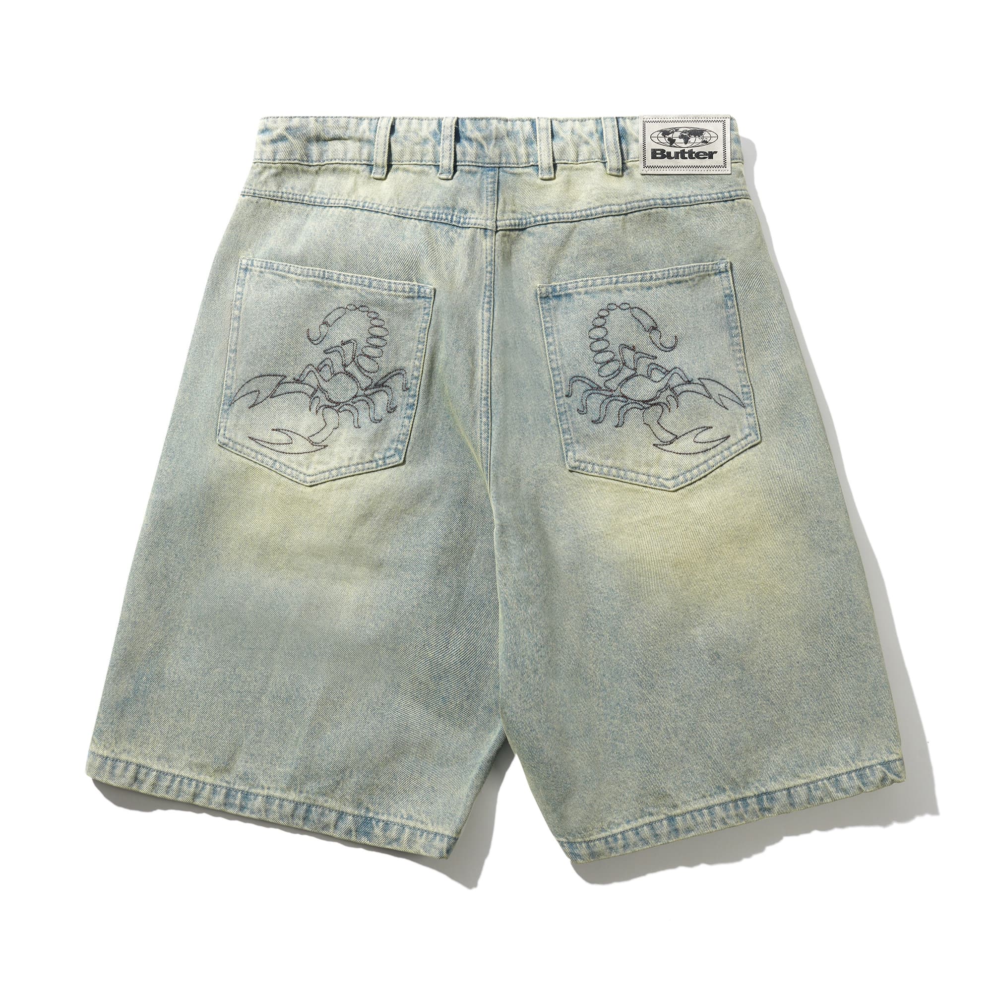 https://admin.plaze-shop.de/wp-content/uploads/2026/02/scorpion_stitch_denim_short_tinted_light_blue_buttergoods_plaze_skateshop-2.jpg