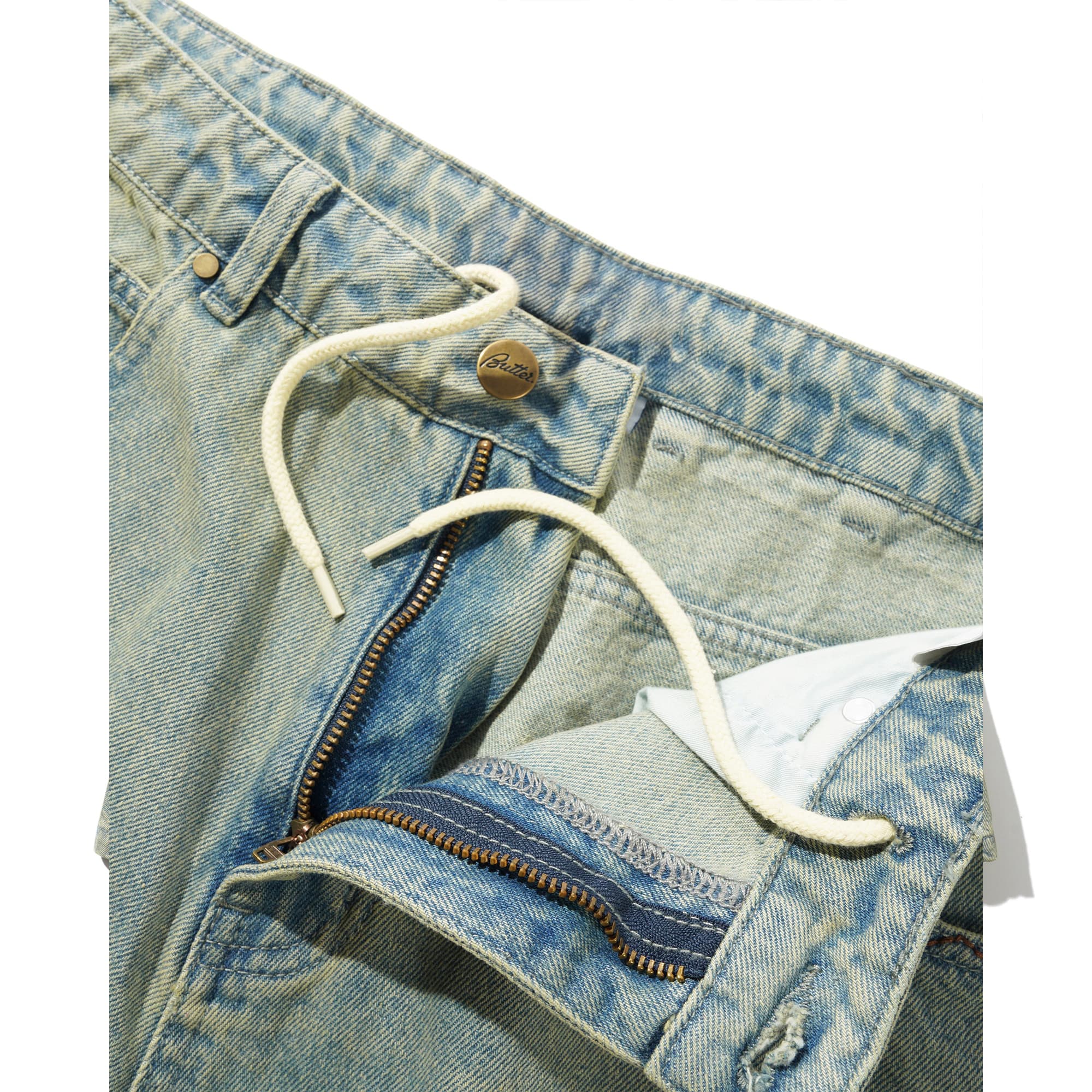 https://admin.plaze-shop.de/wp-content/uploads/2026/02/scorpion_stitch_denim_short_tinted_light_blue_buttergoods_plaze_skateshop-4.jpg