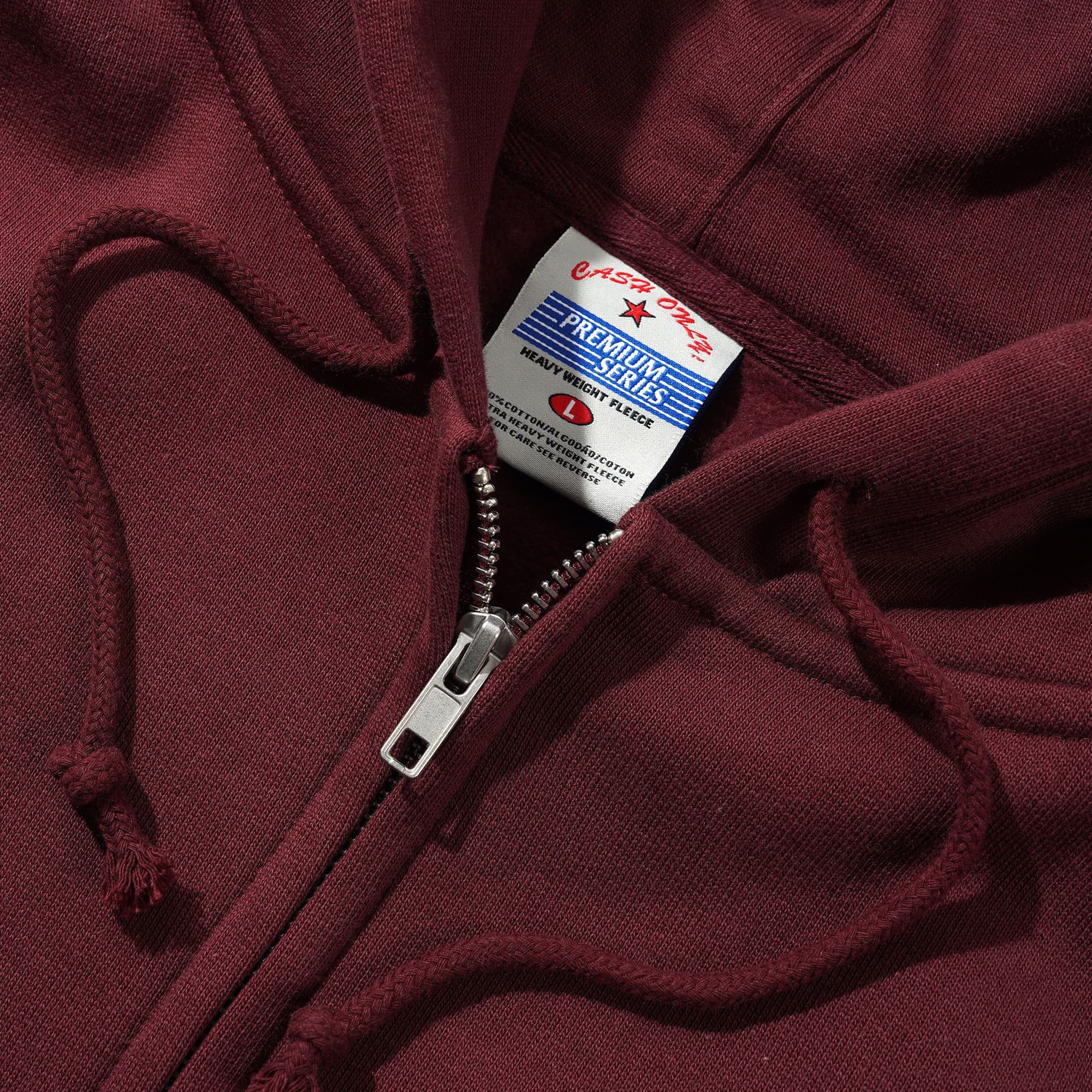 https://admin.plaze-shop.de/wp-content/uploads/2026/07/cashonly_heavy_weight_zip_hood_burgundy_plaze-skateshop4.jpg